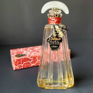 Antyczny flakon perfum Tre-Lis w stylu art déco z lat 30. XX wieku – liliowy lub jaśminowy
