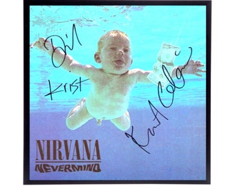 Autographed Nirvana “Nevermind” album cover Replica.  Frame included.  12" x 12" inches.