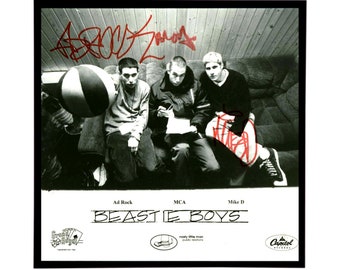 Autographed Beastie Boys "Promo Photo" Replica. FRAME INCLUDED