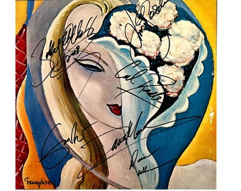 Replika okładki albumu zespołu „Layla” z autografem Erica Claptona,