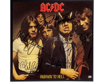 Replica della copertina dell'album autografata da AcDc,