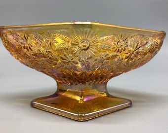 Carnival Glass Marigold Diamond Shaped Pedestal Candy Dish with Floral Pattern.