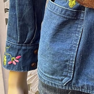 vintage 1970s embroidered denim chore jacket with pockets. Best fits S to M. Embroidery at chest and cuffs. image 5