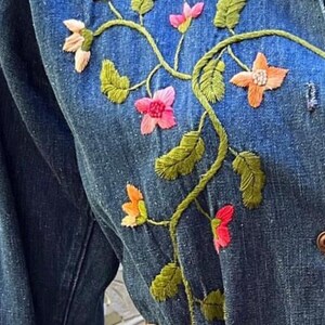 vintage 1970s embroidered denim chore jacket with pockets. Best fits S to M. Embroidery at chest and cuffs. image 3