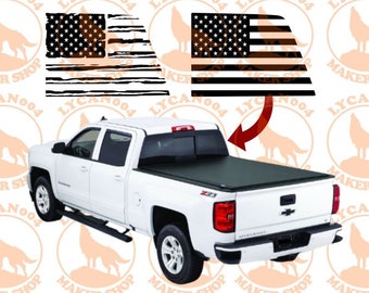 May include: A white pickup truck with a black tonneau cover. The rear window has a black and white American flag decal. The decal is shown in two versions, one with a distressed look and one with a clean look.