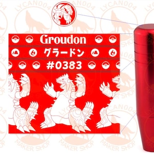 May include: A cylindrical red metal gear shift knob with a smooth finish. Next to it is a red rectangular graphic featuring the white text Groudon, the Japanese characters グラードン, and the number #0383, along with illustrations of the creature Groudon.