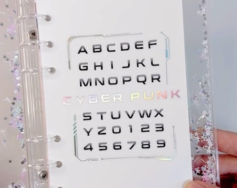 Pegatinas del alfabeto ciberpunk: rollos de cinta holográfica PET · Cinta washi