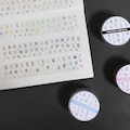 Pixel Pop Alphabet Sticker Roll 25mm x 5m · Kiss cut Washi Tape · Holographic Foil product logo