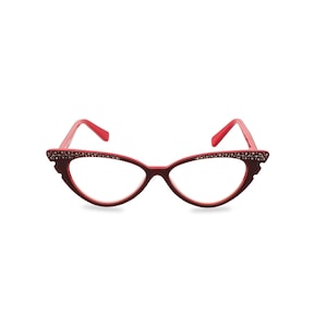 May include: Red cat-eye glasses with rhinestones on the frame.