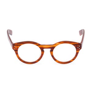 A spectacle of a spectacle, Handmade in fine Italian acetate, FLYNN in Amber, round designer eyeglasses. Heads will turn image 1