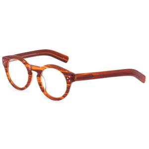 A spectacle of a spectacle, Handmade in fine Italian acetate, FLYNN in Amber, round designer eyeglasses. Heads will turn image 2