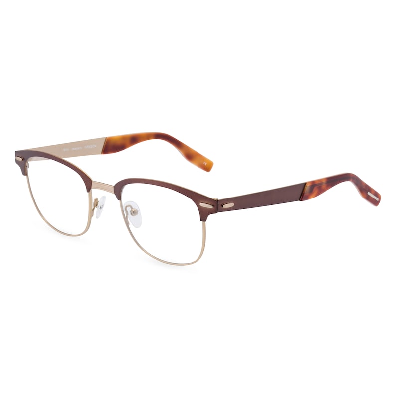 May include: Eyeglasses with a brown and gold frame. The top of the frame and the arms are brown, while the bottom of the frame is gold. The arms have a tortoiseshell pattern at the ends.
