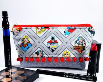 Trapezium Toiletry Bag for Cosmetic or Makeup made of Fabric - Zippered Pouch for Travel Organizing with female super hero print DC Comics