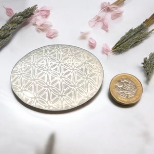 Etched selenite crystal palmstone