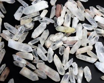 Small madagascan quartz crystal points raw natural 100g bag