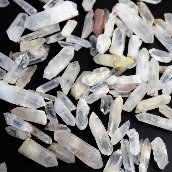 Small madagascan quartz crystal points raw natural 100g bag