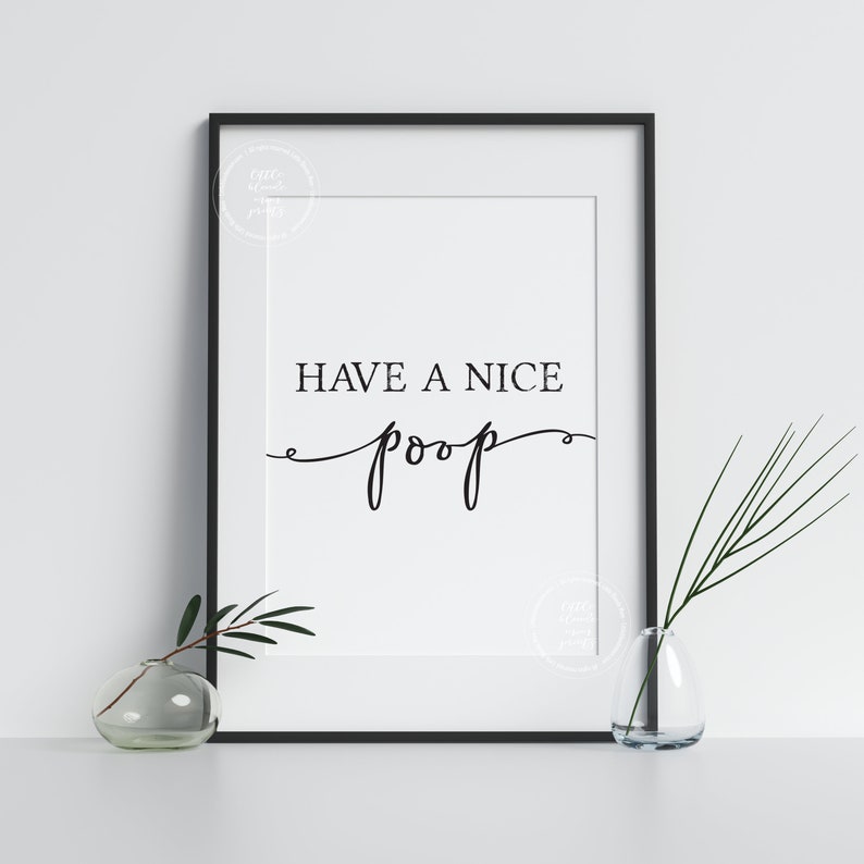 May include: A black and white printable wall art print with the text "Have a nice poop" in a cursive font.