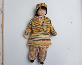 Porcelain doll , Vintage porcelain doll , girl in  traditional volk cloth