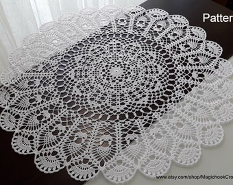 May include: White crochet doily with a delicate, intricate pattern. The doily is circular and has a scalloped edge. The pattern is reminiscent of a flower or a star.