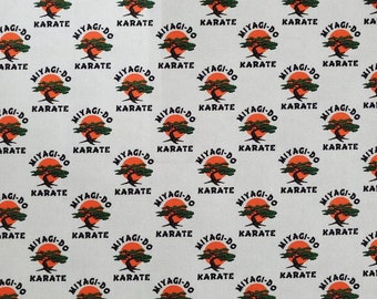 Stretchy Dojo Logo Small Scale Cotton Lycra Fabric by the Yard or 1/2 yard or Fat Quarter or Tumbler Cut, Martial Arts, Grey background
