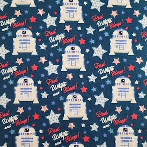 May include: A blue fabric with a repeating pattern of white robots, red stars, and the text "Red White and Bloop!"