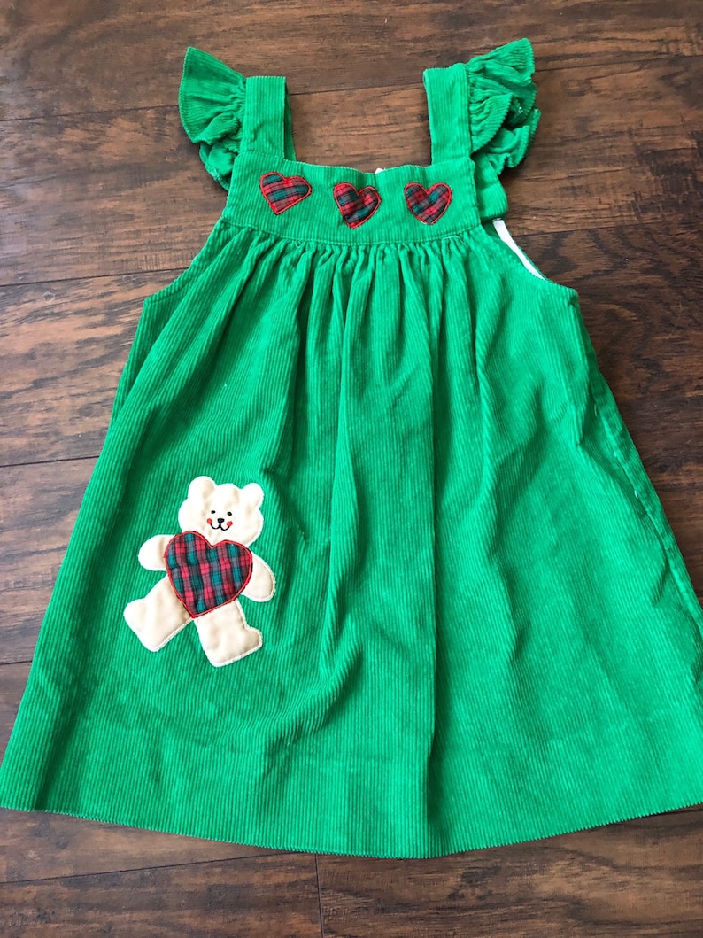 green jumper dress