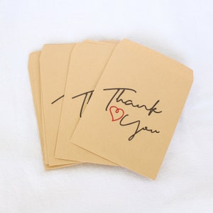 Bolsas artesanales de papel con el símbolo "Gracias", bolsas de papel bronceado, bolsas de regalo hechas a mano, bolsas de papel de regalo personalizadas, bolsas de regalo gráficas de letras a granel