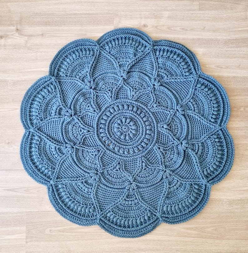 Floral, blue crochet floor rug.