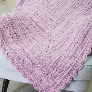 Crochet blanket on a chair.