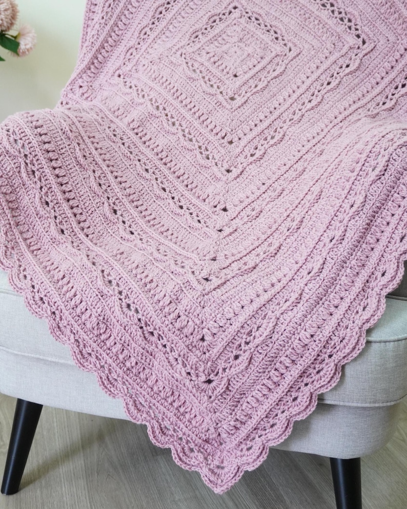 Crochet blanket on a chair.