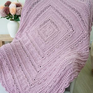 Crochet blanket on a chair.