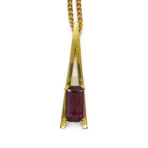 Avon gold tone modernist pendant with purple glass stone, vintage pendant and chain