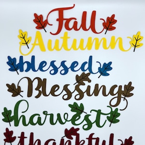 May include: Fall, Autumn, Blessed, Blessing, Harvest, Thankful.  A set of six words with fall leaves in various colors.