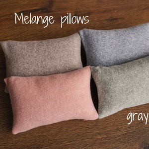Soft newborn pillow prop – gentle posing support for photography