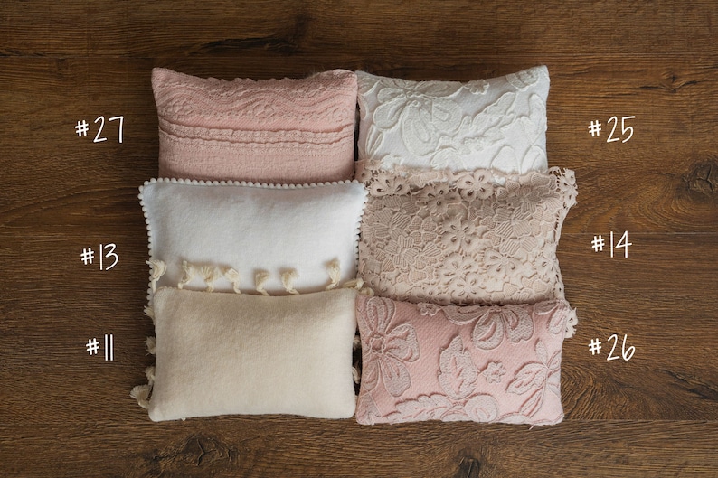 Newborn posing pillow — soft pastel shades, plush support, and essential prop for cozy, timeless baby photography