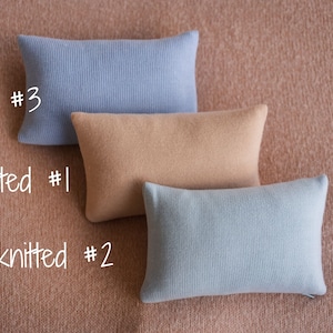 Soft newborn pillow prop – gentle posing support for photography