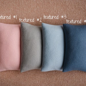 Soft newborn pillow prop – gentle posing support for photography