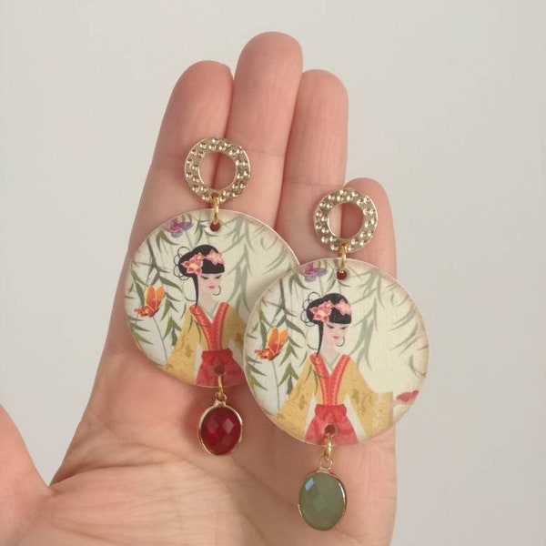 Paper earrings with pendant in the shape of a circle and Japanese image with red and green stones