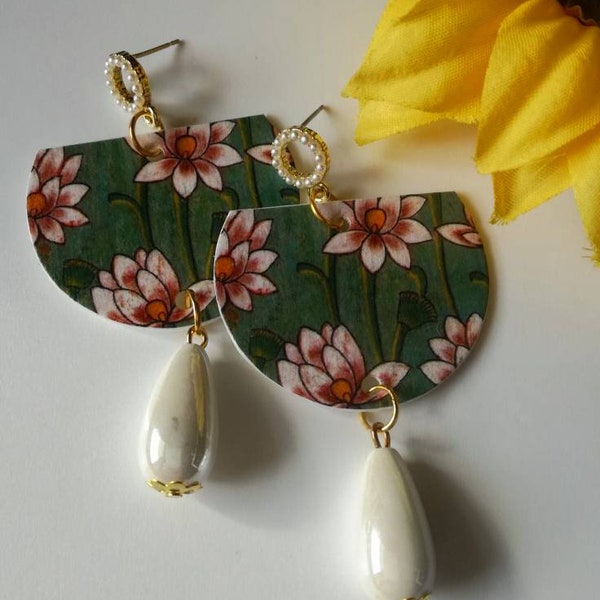 Hanging paper earrings with floral pendant and aqua-green pearl