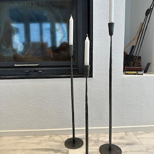 Sleek and trendy Hand Forged Iron Candle Stand