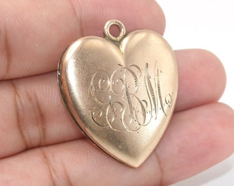 Antico medaglione a cuore dorato di W&H Co.