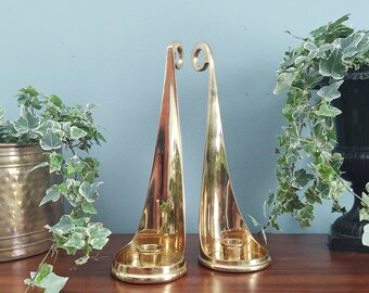 Set of two bohemian brass candlestick holders tall triangular backplate and fingerloop