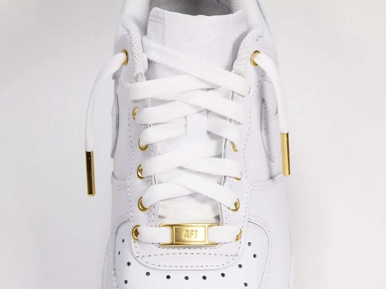 men's white and gold air force 1
