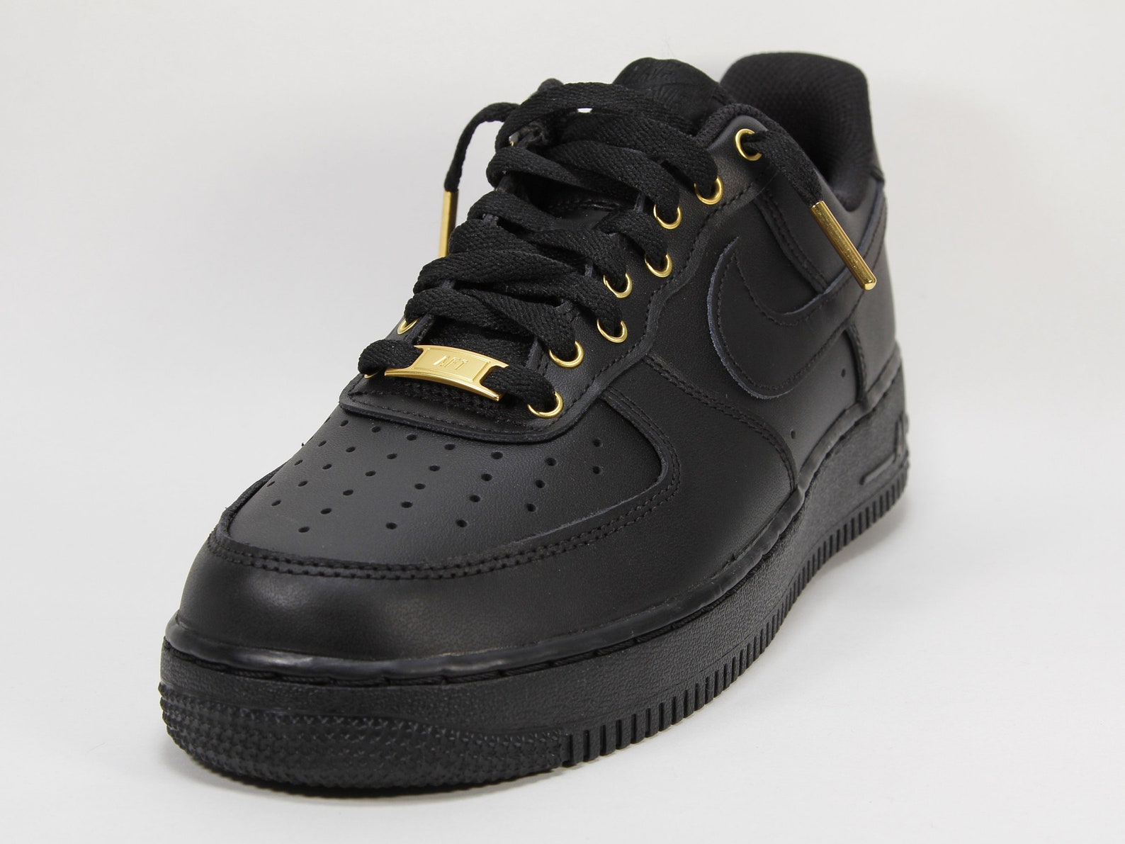 nike air force 1 black gold