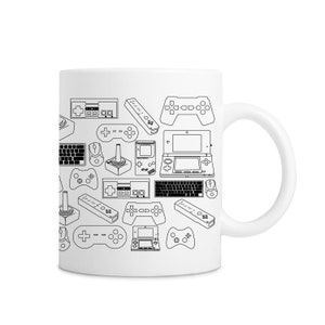 May include: White ceramic mug with a black outline design of various video game controllers, consoles, and accessories. The design includes a Nintendo Entertainment System, Super Nintendo, Sega Genesis, Playstation, Xbox, Nintendo DS, and Wii.