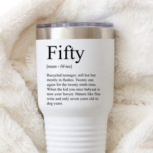May include: White stainless steel tumbler with a black inscription that reads "Fifty [noun - fif-tee] Recycled teenager, still hot but mostly in flashes. Twenty one again for the twenty ninth time. When the kid you once babysat is now your lawyer. Mature like fine wine and only seven years old in dog years."