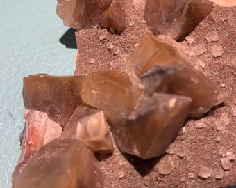 Red dogtooth calcite Mexico pyramidal