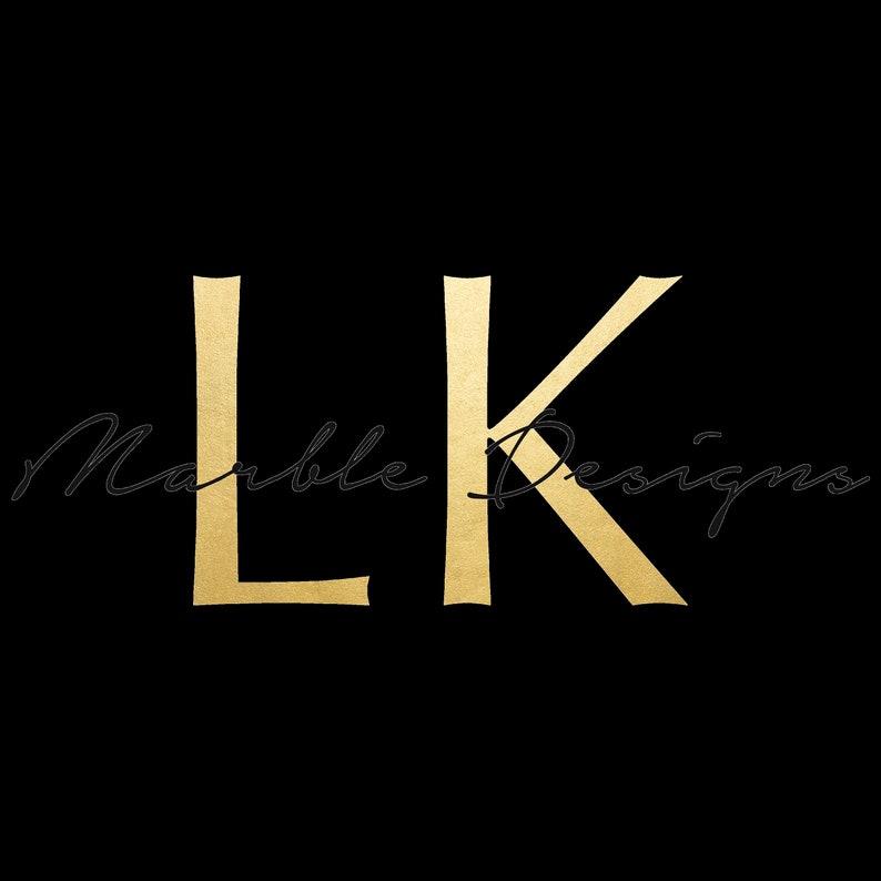 May include: Gold letters "LK" with the text "Marble Designs" in cursive script below.