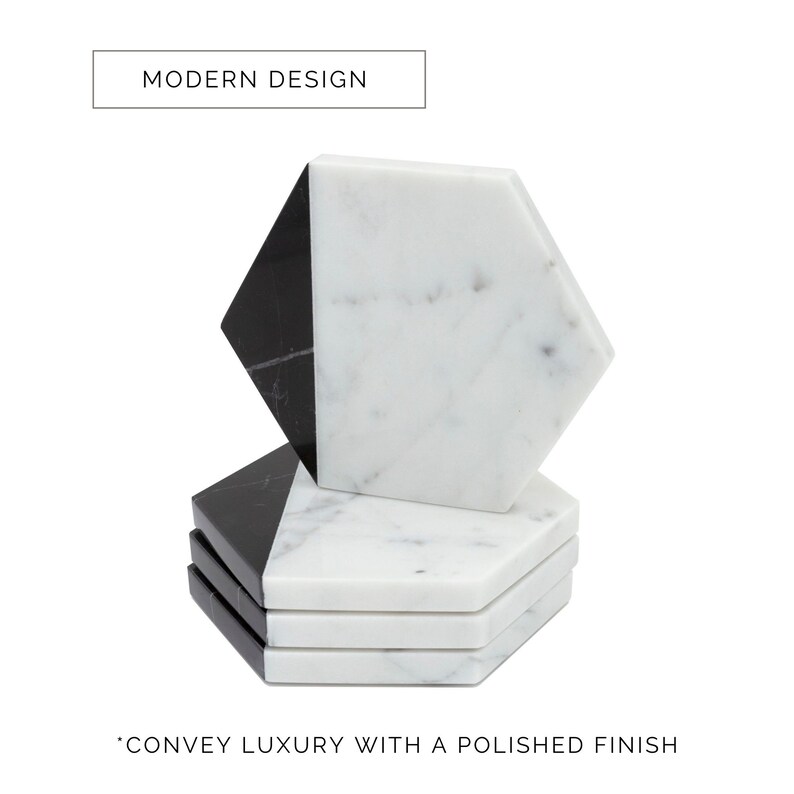 May include: Set of four hexagonal coasters made of white marble with a black marble accent. "MODERN DESIGN" is written in a white rectangle on a black background at the top of the image. "CONVEY LUXURY WITH A POLISHED FINISH" is written at the bottom of the image.