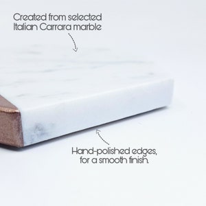 May include: A white marble serving board with a smooth, hand-polished edge. The board is made from selected Italian Carrara marble.
